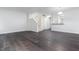 Spacious living area with hardwood floors, staircase, and ample natural light at 105 Sir Richard Ln, Chapel Hill, NC 27517