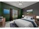 Bedroom showcasing a light gray color scheme and natural light from the window at 106 Oak Rd, Butner, NC 27509