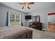 Relaxing bedroom featuring a ceiling fan and a spacious layout at 106 Oak Rd, Butner, NC 27509