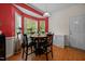 Cozy dining area featuring a bay window and a table with chairs at 106 Oak Rd, Butner, NC 27509