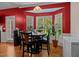 Inviting dining area with bay window, table, and chairs at 106 Oak Rd, Butner, NC 27509
