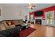 Inviting living room featuring vaulted ceilings, a fireplace, and modern decor at 106 Oak Rd, Butner, NC 27509