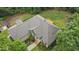Aerial view of the home's roof, entryway, and surrounding greenery at 109 Springwood Dr, Wake Forest, NC 27587