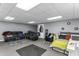 Basement space with carpet flooring, gray walls, and plenty of living space at 1112 Newberry Dr, Mebane, NC 27302