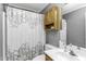 Bathroom with tub shower and vanity at 1112 Newberry Dr, Mebane, NC 27302