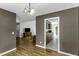 Living room featuring hardwood floors and an open view of the kitchen at 1112 Newberry Dr, Mebane, NC 27302