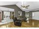 Open-concept living room seamlessly connects to the kitchen and dining areas at 1112 Newberry Dr, Mebane, NC 27302