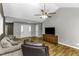 Spacious living room with hardwood floors and lots of natural light at 1112 Newberry Dr, Mebane, NC 27302