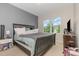 Comfortable bedroom featuring a queen bed and lots of natural light from the large window at 1217 Trilogy Blvd # 174, Morrisville, NC 27560