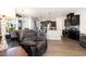 Open-concept eat-in kitchen, dining area, hardwood floors and an island with seating at 1217 Trilogy Blvd # 174, Morrisville, NC 27560