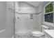 Clean, renovated bathroom features a glass shower, modern tile and finishes at 123 Becket Bend Bnd, Pittsboro, NC 27312