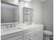 Updated bathroom with double sinks, bright vanity and recessed lighting at 123 Becket Bend Bnd, Pittsboro, NC 27312