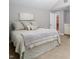 Neutral bedroom features a large bed, walk-in closet and soft, natural light at 123 Becket Bend Bnd, Pittsboro, NC 27312