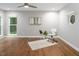 Office space with hardwood flooring, modern decor, and natural light from two windows at 123 Becket Bend Bnd, Pittsboro, NC 27312