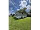Exterior view of home showing yard, siding, and deck at 124 Kearney Ave, Oxford, NC 27565