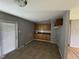 Functional kitchen featuring wooden cabinets and a neutral backsplash at 124 Kearney Ave, Oxford, NC 27565