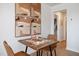 Cozy dining area featuring stylish art and a game table, perfect for gatherings and relaxation at 1305 Westerland Way # 17, Durham, NC 27703