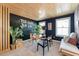 Inspiring home office decorated with a podcasting theme, plants, and lots of natural light at 1305 Westerland Way # 17, Durham, NC 27703