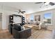 Spacious living room offers a relaxing setting with a large sofa, modern decor, and plenty of natural light at 1305 Westerland Way # 17, Durham, NC 27703