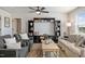 Comfortable living room featuring stylish furnishings, a large entertainment center, and a cozy atmosphere at 1305 Westerland Way # 17, Durham, NC 27703