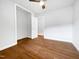 Bedroom features hardwood floors and a closet at 1311 Meadow Ln, Chapel Hill, NC 27516