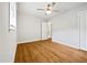 Inviting bedroom showcases gleaming hardwood floors, neutral walls, and ample natural light at 1311 Meadow Ln, Chapel Hill, NC 27516