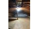 A large attic with exposed rafters offers ample storage and potential for customization at 1416 Bramble Dr, Durham, NC 27712