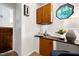 A home office nook with a desk, chair, and unique octagonal window for natural light at 1416 Bramble Dr, Durham, NC 27712