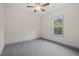 Comfortable bedroom featuring carpet, a ceiling fan, and a window with natural light at 147 Harmony Trl, Broadway, NC 27505