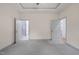 Large main bedroom with carpeted flooring and en suite bathroom access at 147 Harmony Trl, Broadway, NC 27505