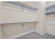 A bright walk-in closet featuring shelving and clothing rods for ample storage at 147 Harmony Trl, Broadway, NC 27505