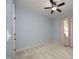 Bright bedroom with plush carpeting, a ceiling fan, and natural light at 150 Churchill Rd, Louisburg, NC 27549