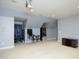 Spacious game room featuring pinball machine, arcade games, and comfortable seating at 150 Churchill Rd, Louisburg, NC 27549