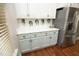 Kitchen with quartz countertops, stainless steel appliances, and cabinet storage at 150 Churchill Rd, Louisburg, NC 27549