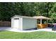 This property has a shed with an attached outdoor kitchen, providing storage and a convenient space for outdoor meal preparation at 150 Churchill Rd, Louisburg, NC 27549