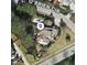 Aerial shot of landscaped property on O'Brien Cir, showcasing roof, mature trees, and manicured lawns at 1512 Obrien Cir, Wake Forest, NC 27587