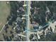 Aerial view showcasing the neighborhood of a home, nearby golf course, and surrounding greenery at 1512 Obrien Cir, Wake Forest, NC 27587