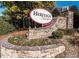 Welcome to Heritage Heights, a beautifully landscaped community with stone entrance and welcoming signage at 1512 Obrien Cir, Wake Forest, NC 27587