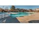 Community pool with crystal-clear water, lifeguard station, and shaded seating area offers a relaxing environment at 1512 Obrien Cir, Wake Forest, NC 27587