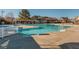A large community pool with ample seating and a clubhouse for a relaxing outdoor experience at 1512 Obrien Cir, Wake Forest, NC 27587