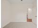 Bright bedroom with neutral carpet, an open door, and large blank walls ready to be decorated at 156 Harmony Trl, Broadway, NC 27505