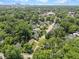 An aerial view of the neighborhood showcasing tree-lined streets and well-maintained homes at 1901 White Oak Rd, Raleigh, NC 27608
