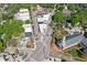 Aerial view of city street and neighborhood showcasing nearby commercial district and residences at 1901 White Oak Rd, Raleigh, NC 27608