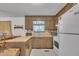 Functional kitchen featuring wood cabinetry, practical layout, and essential appliances at 2005 Messer Rd, Raleigh, NC 27603