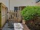 Enclosed backyard features a privacy fence, stone pavers and low maintenance landscaping at 2021 Rivergate Rd # 102, Raleigh, NC 27614