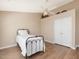 Bedroom featuring closet, single bed, and ceiling fan at 2021 Rivergate Rd # 102, Raleigh, NC 27614