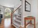 Inviting living room showcases a large arched window and neutral tones at 2021 Rivergate Rd # 102, Raleigh, NC 27614