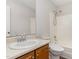 Bathroom featuring tub-shower combo and wood vanity at 2108 Carthage Cir, Raleigh, NC 27604