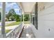 Side view of the front porch, showing white railing and house number at 2108 Carthage Cir, Raleigh, NC 27604