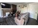 Living room features a brick fireplace and comfortable seating at 212 S Sixth St, Smithfield, NC 27577